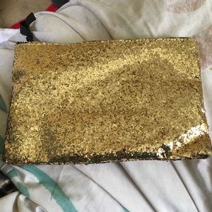 Gold makeup bag